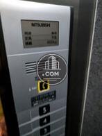 エレベーター９名乗り
