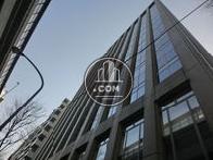 高速道路側の外観で、こちらも窓面が多いです