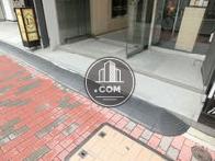 スロープの固定された玄関前の床面