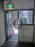 エレベーターフロア奥の階段入口に通じる扉