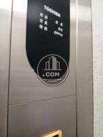 エレベーター9名乗り