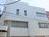 角にカーブを用いた建物